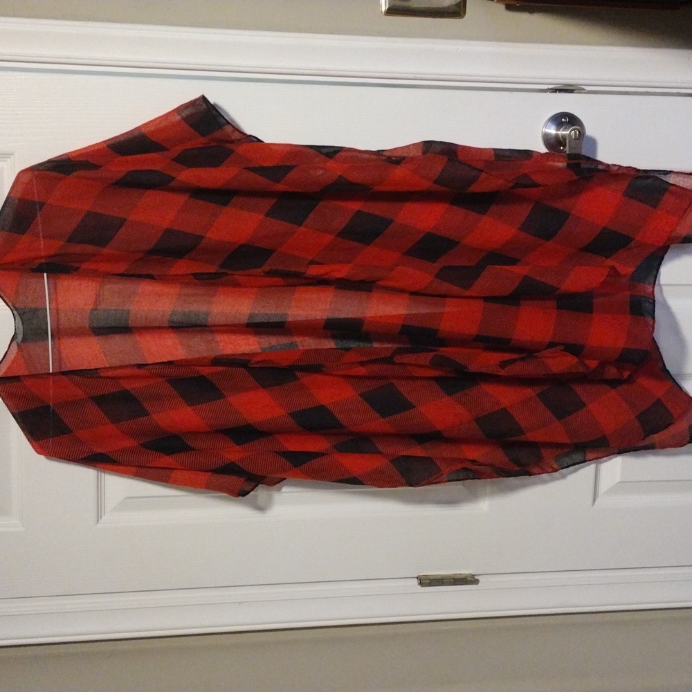 Red and black light weight wrap - open in front with opening for arms.